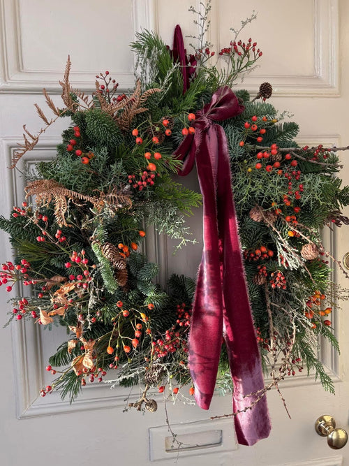 Seasonal hand made wreath with velvet ribbon. Made in East Lothian